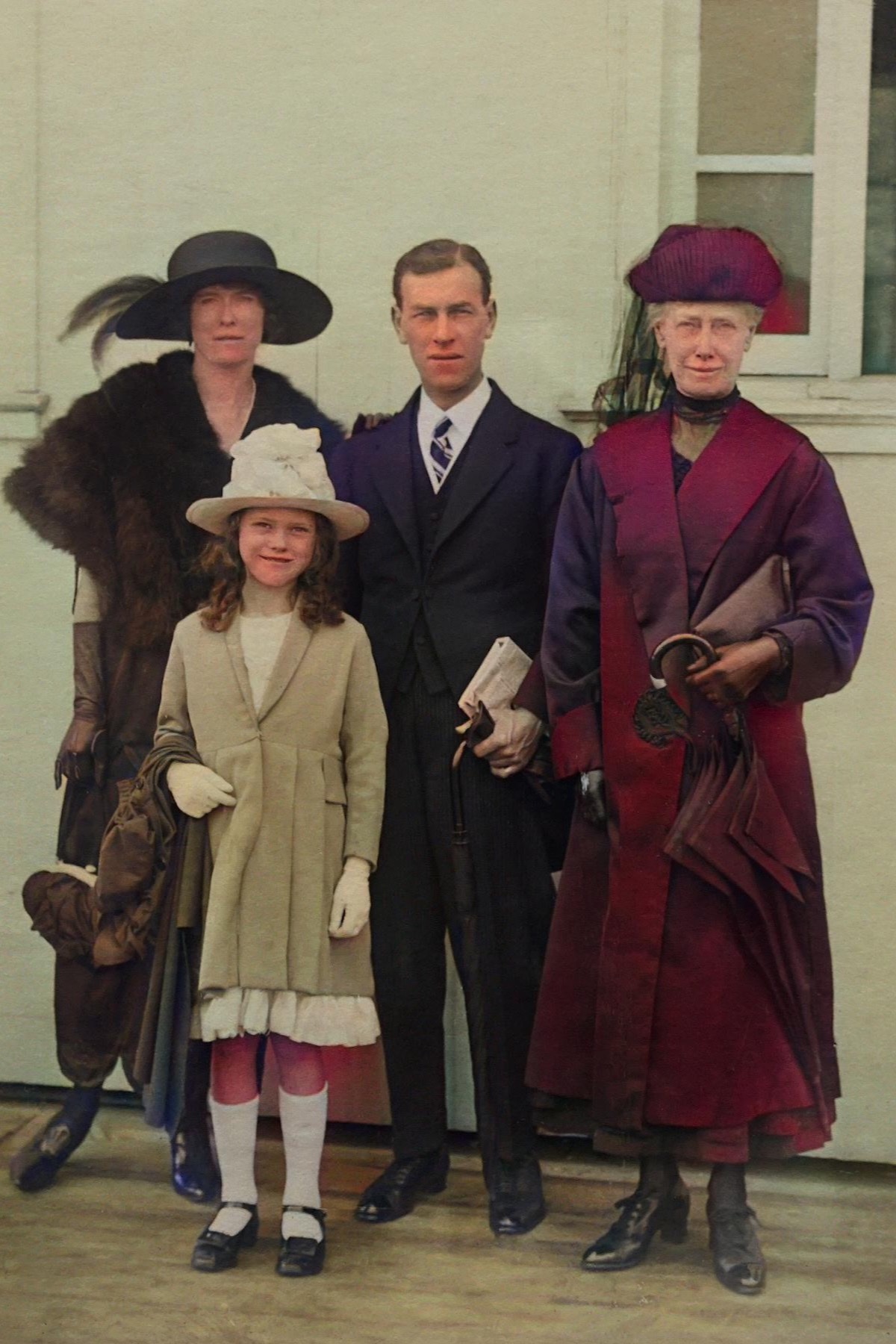 Colorized vintage family portrait after AI restoration